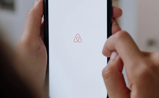 Opening the Airbnb app to book a stay with Rise Co-Host in Canmore