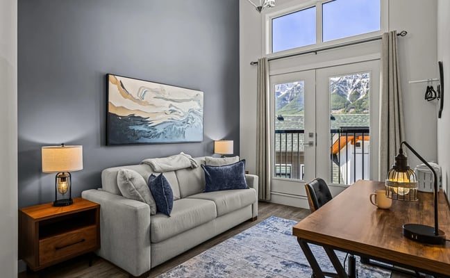 Cozy bedroom at a Rise Co-Host property in Canmore